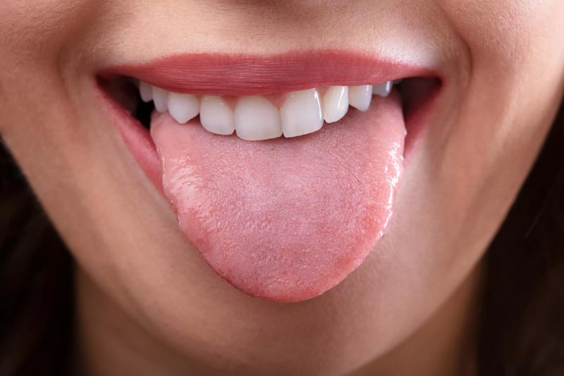 Woman showing her tongue