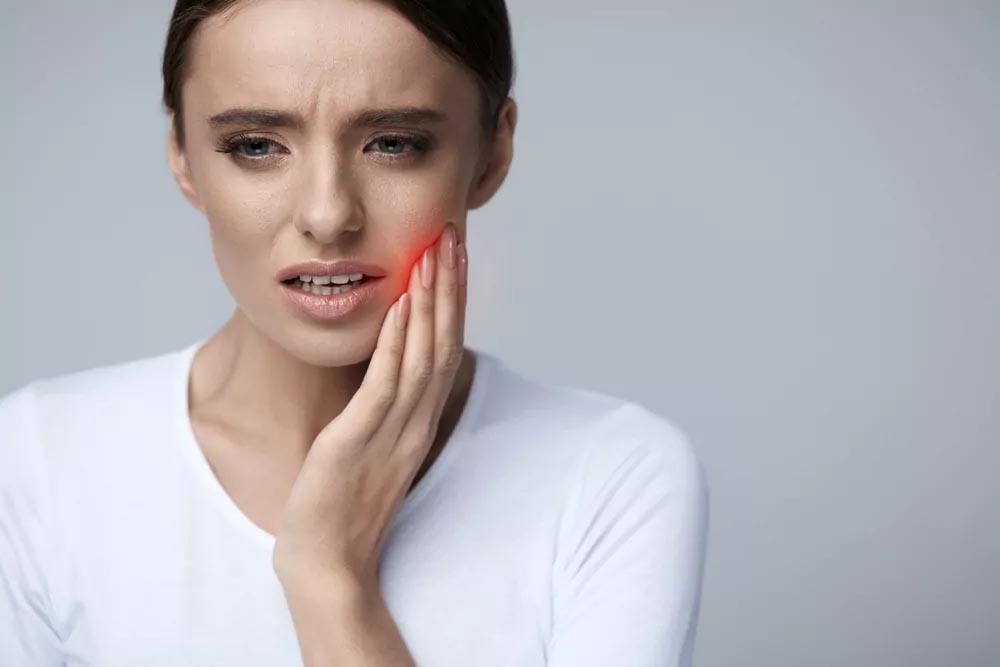 Woman having toothache